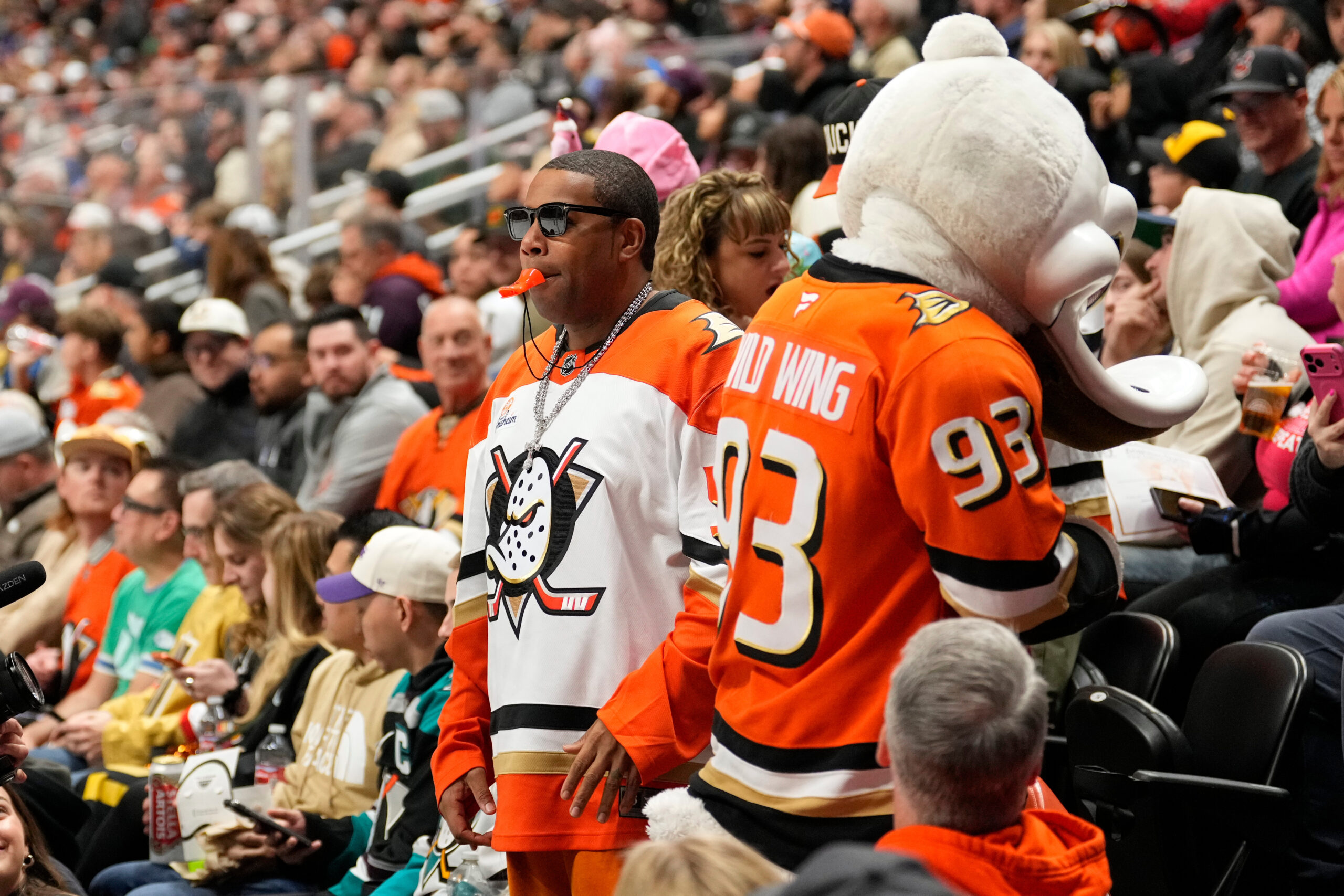 Entertainer Kenan Thompson stands among the crowd during the second...