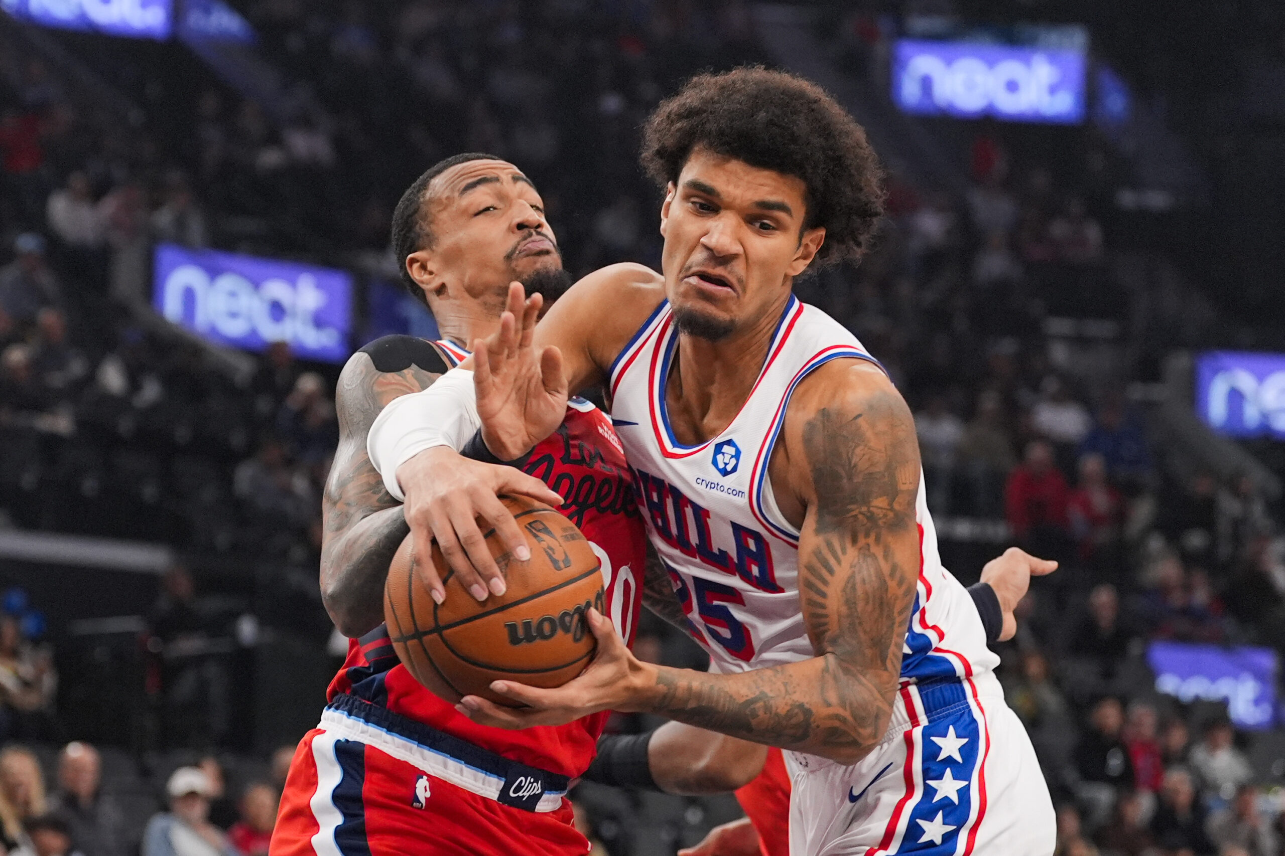 Philadelphia 76ers forward Dominick Barlow (25) is defended by Clippers...