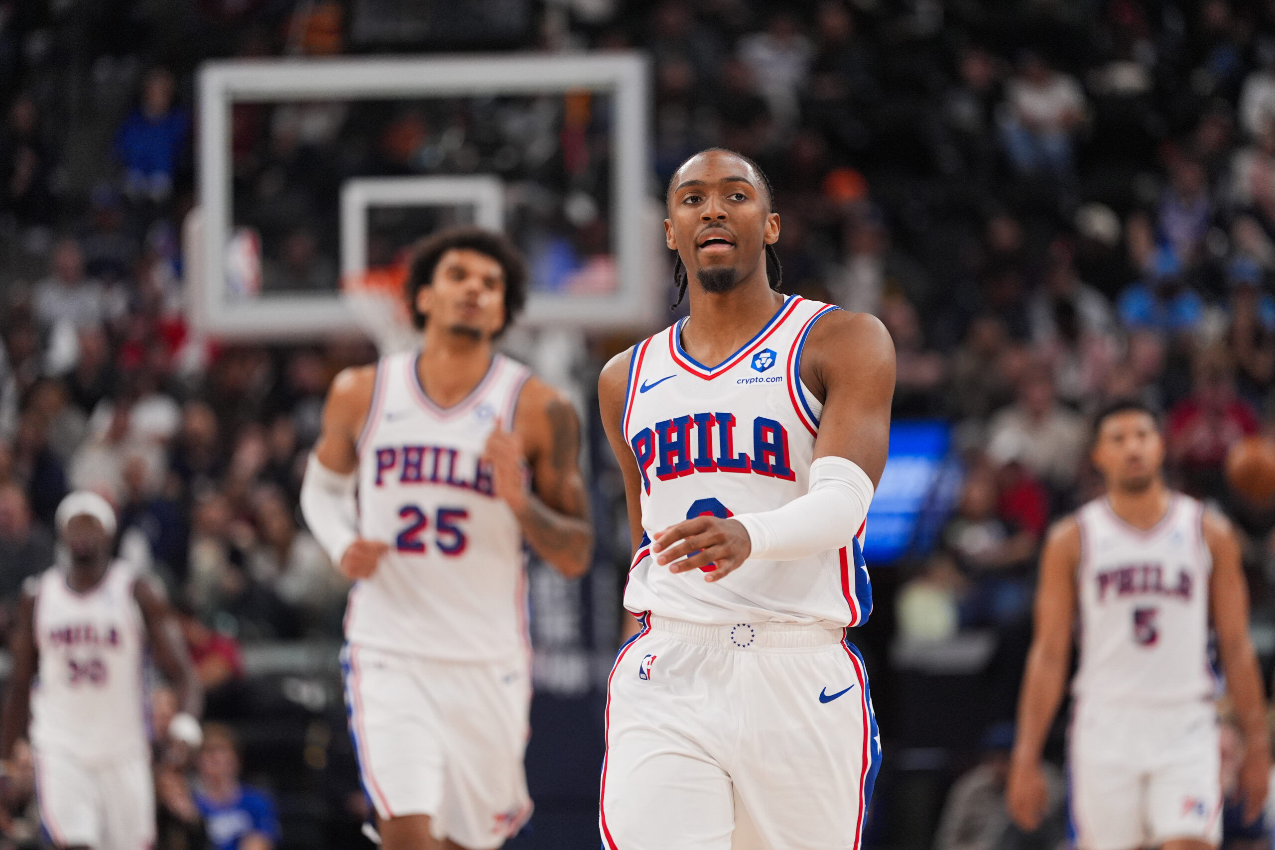 Philadelphia 76ers guard Tyrese Maxey (0) walks up the court...