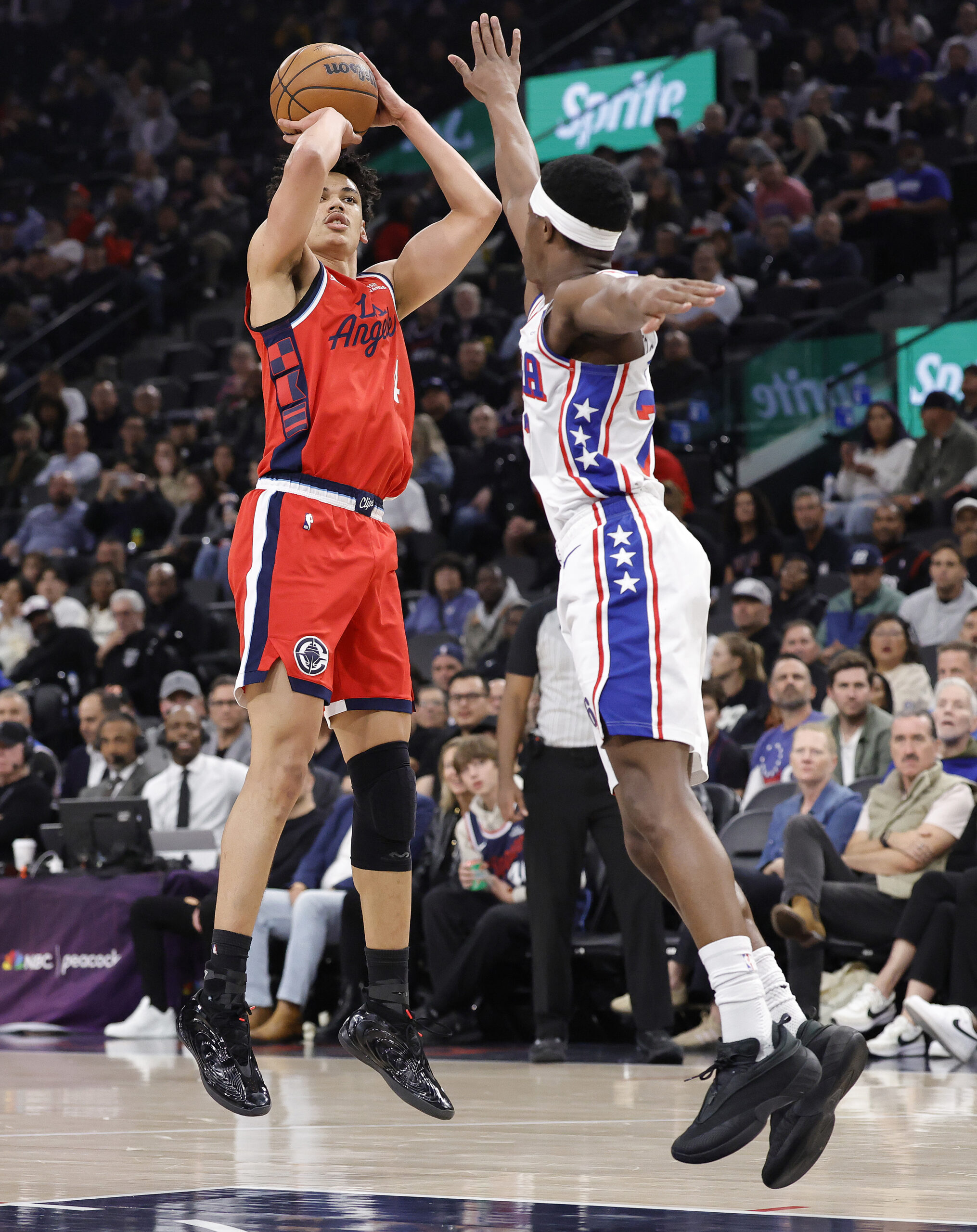 The Clippers’ Kobe Sanders takes a shot as the Philadelphia...