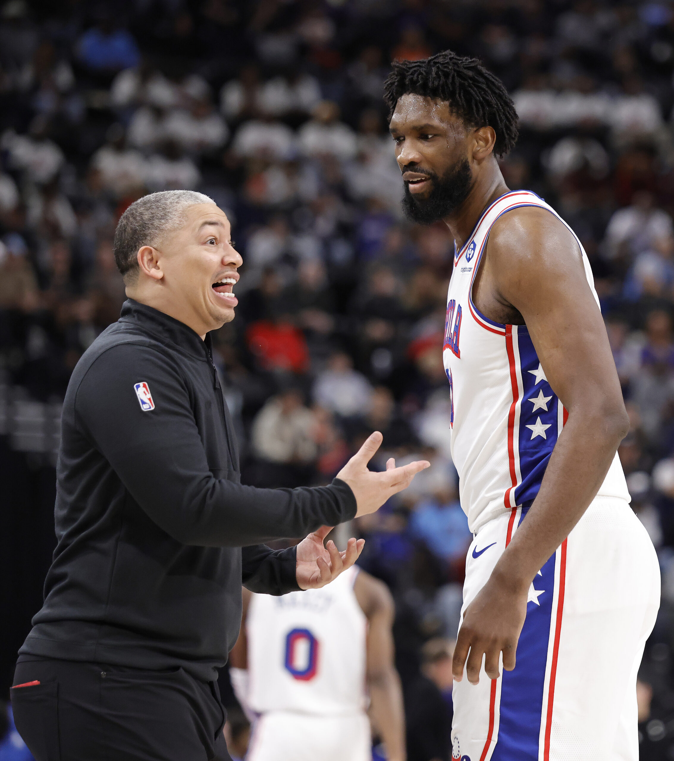 Clippers coach Tyronn Lue reacts on the sideline in front...